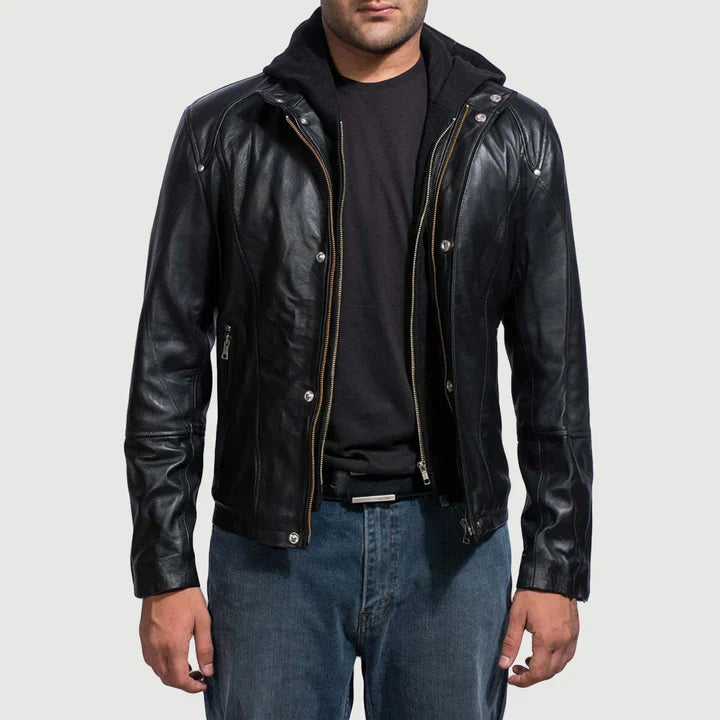 Man wearing a black leather jacket over a black hoodie on a white background